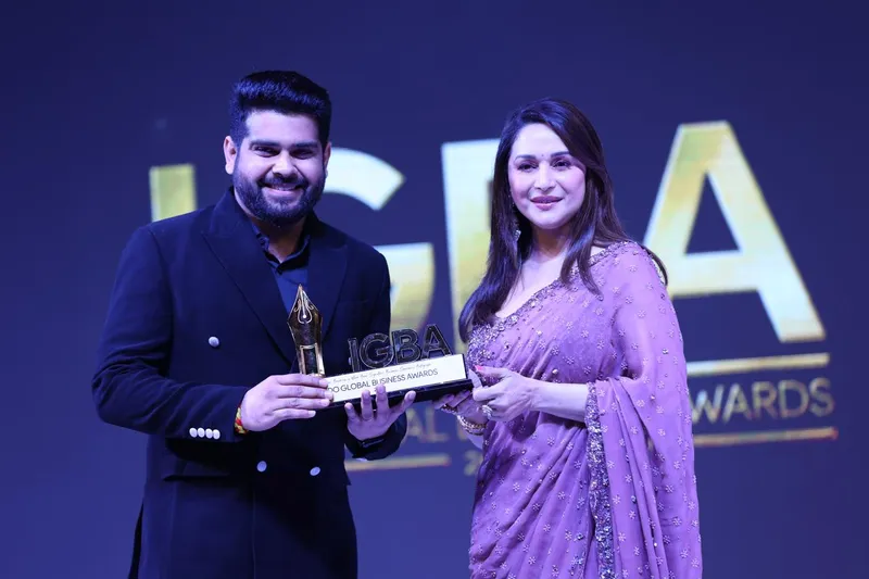 Aakarshak Packaging team receiving an award